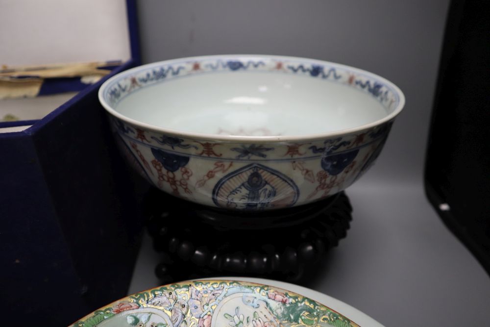 A group of Chinese and Japanese porcelain bowls and plates, 18th century and later, together with a Chinese hardstone censer and cover,